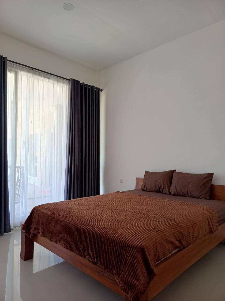 Zavana Rooms & Restaurant Tanjungkarang Eksteriør bilde